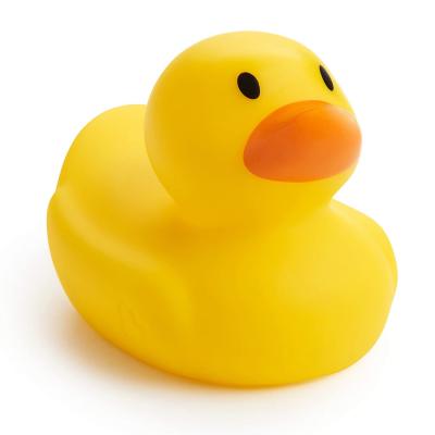 Photo of a bright yellow rubber duck with an orange beak